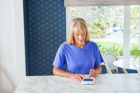 INR OlderWhiteWoman Kitchen CoagSense